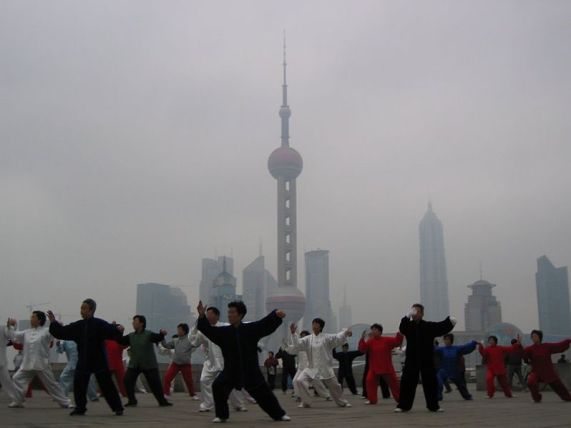 Yang Style Taiji in Shanghai, 2005.  The traditional Chinese martial arts are always forced to create a sheltered space within the larger community. Source: Wikimedia.