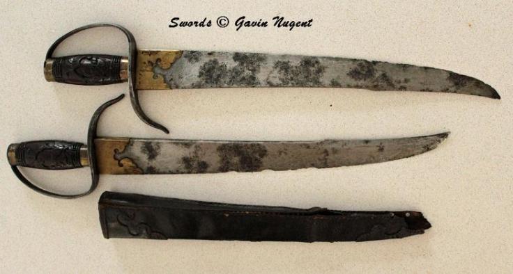 Another set of hudiedao from the private collection of Gavin Nugent. These blades are some of the earliest seen in this post. They also show signs of significant use. Note the complex profile of the blades and how the spine flattens out as it approaches the tip. This allows the weapon to have reach while not feeling "top heavy." The owner notes that these are the most comfortable hudiedao that he has handled. Source: http://www.swordsantiqueweapons.com/
