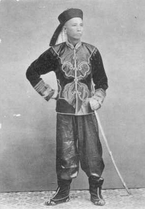 Another Qing military officer armed with a western style saber, circa 1900.