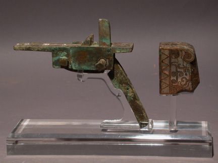A bronze crossbow lock from the Waring States period.  Source: Wikimedia.