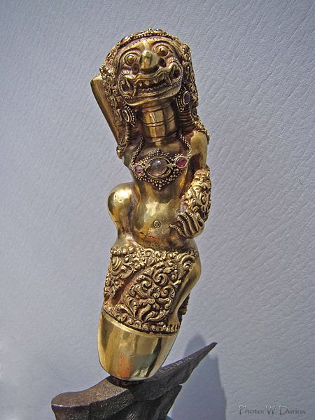 A highly detailed kris hilt.  Source: Wikimedia.