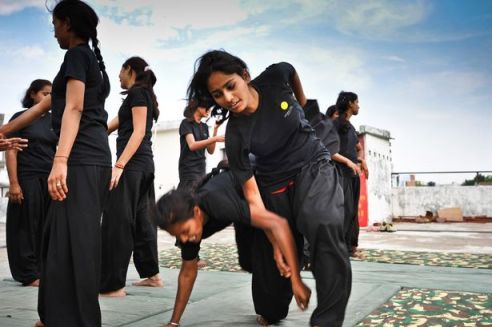 Women practicing martial arts in India.  Source: Mirror.