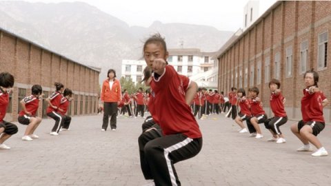Female student studying Wushu in a scene from Inigo Westmeier's Dragon Girls.