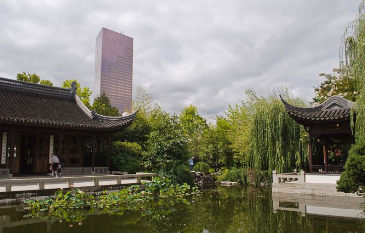 A traditional garden with a modern created within a modern city. Source: Wikimedia.