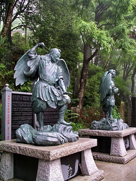 Statues of Tengu, a Japanese mountain demon sometimes associated with the transmission of secret martial knowledge, on My. Takao.  Source: Wikimedia.