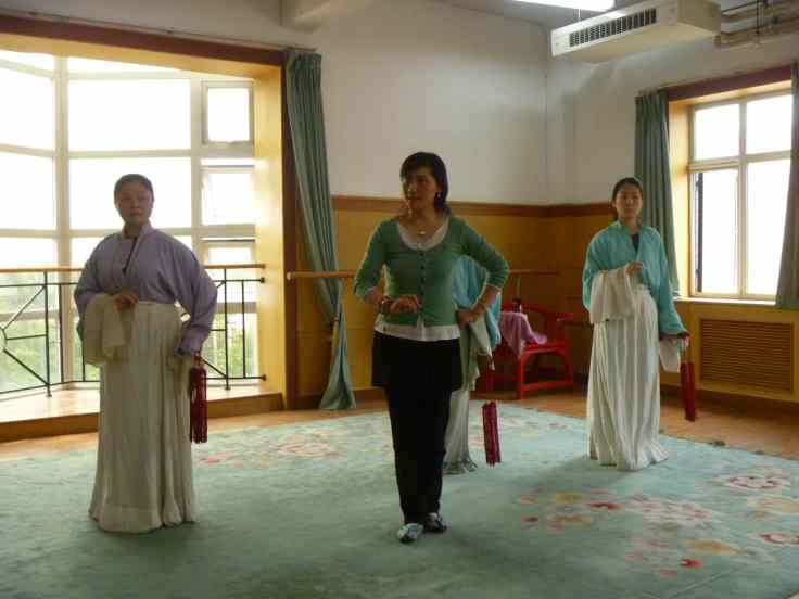 Prof. Yan teaching Kunju.  Source: Property of Daniel Mroz.