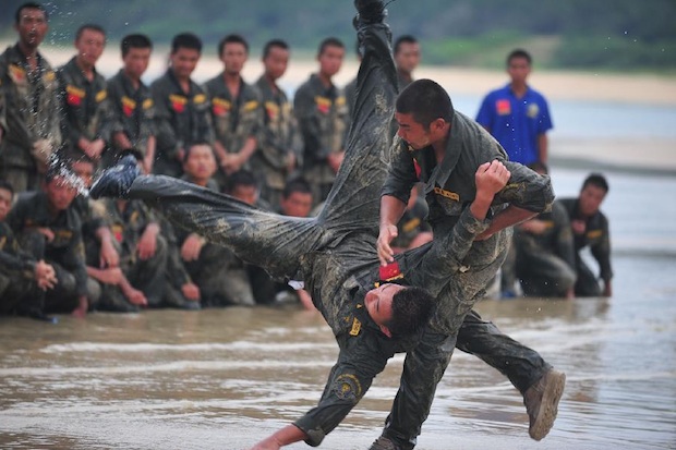 A private bodyguard training program in Sanya, Hainan, held by Ginghis Security Academy.  Source: Xinhua.