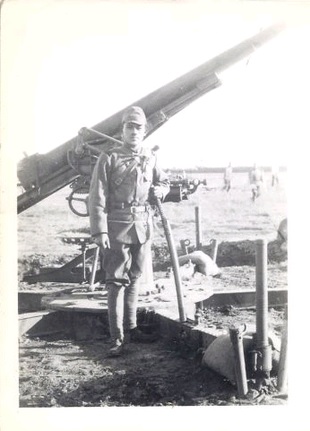 An image of a Japanese soldier holding a Gunto in China during WWII.  This image was in the photo album along with the record of confiscated weapons below.  Source: Author's personal collection.