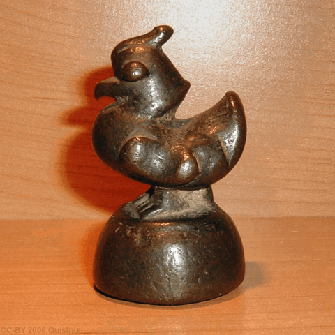 A weight used in the measurement and sale of opium.  Source: Wikimedia.