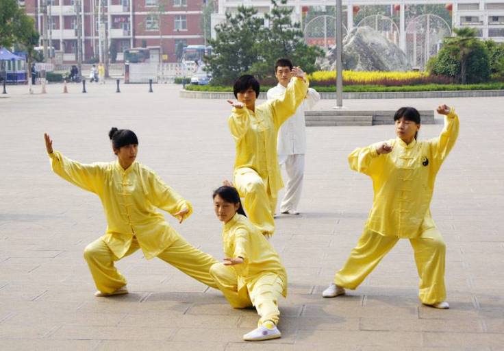University students who are taking classes on the traditional martial arts in China.