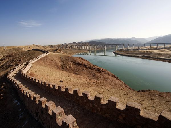 The Yellow River running along side the great wall of China.  Frequent floods of this silt laden waterway both impoverished sections of Shandong and contributed to the rise of banditry and disorder.