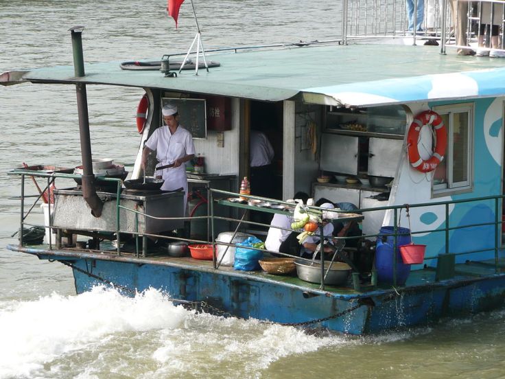 Preparing lunch on a tourist boat on the Pearl River.  Source: Wikimedia.