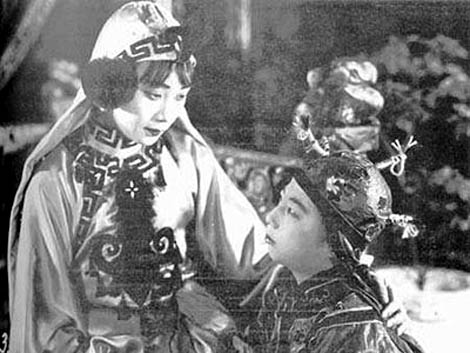 An advertising card for the "Burning of the Red Lotus Temple," the first Chinese martial arts film. 1928.