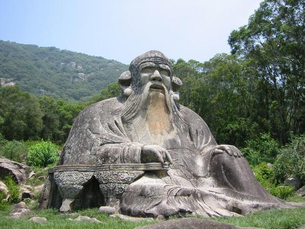 A stone sculpture of Laozi, located north of Quanzhou at the foot of Mount Qingyuan.  Another figure who came to be venerated by the Red Spear Movement.  Source: Wikimedia.