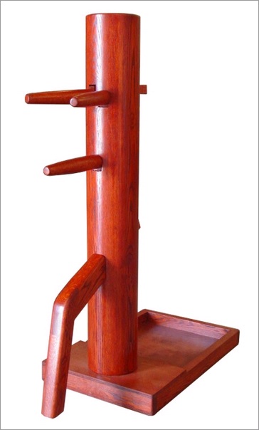 This dummy has a laminated wooden body and is mounted on a freestanding base. This is currently the most commonly purchased style of (full sized) wooden dummy. Photo: Everything Wing Chun