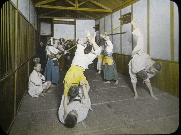 A hand colored magic lantern slide, produced in Japan, showing both Judo and Kendo.  Source: Author's Personal Collection.
