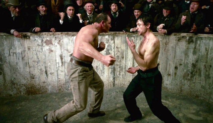 A great example of a close range fight scene from the 2009 Sherlock Holmes.  This scene has always fascinated me as it attempts seems to both educate the viewer about technical aspects of the fight that is unfolding through a discussion of Holmes' personality.