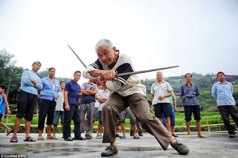 An older resident of the same village demonstrating a form with dual iron whips. Source: http://www.dailymail.co.uk