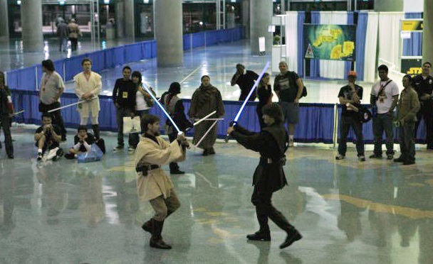A choreographed reenactment of the final duel in Episode III: Revenge of the Sith. Photo by Jenny Elwick. Source: Wikimedia.