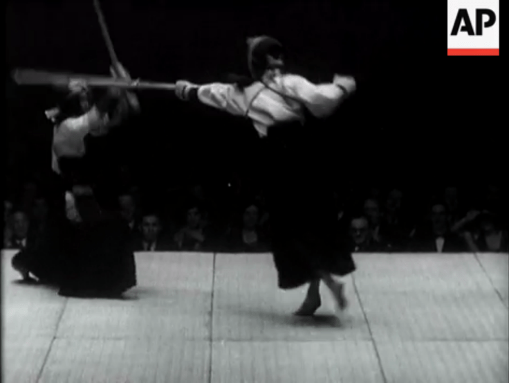 "London Sees the Thrill of Japanese Sports." A still taken from from a vintage newsreel showing a kendo exhibition match.  1932.
