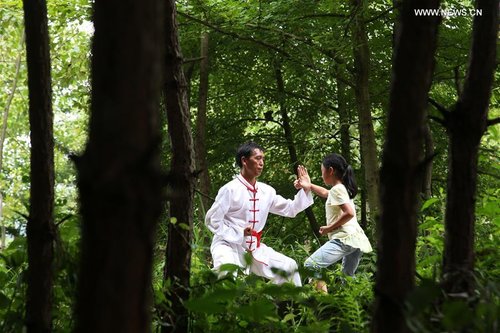 Chinese children learn the martial arts.