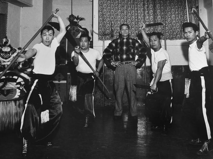 Lau Bun (top center) with senior students in his Hung Sing School of Choy Li Fut in San Francisco's Chinatown, one of the oldest martial arts schools in America. During the summer of 1959, 18-year-old Bruce Lee had a little-known run-in with Lau Bun and his senior students. (Photo courtesy of UC Berkeley)