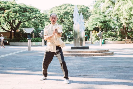 Master Li Tin Loy of the Chow Ka Southern Praying Mantis system in a Hong Kong Part. Source: Time