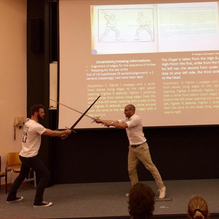 Eric Burkart (left) and Sixt Wetzler engaging in a frank exchange of ideas at the 2016 Martial Arts Studies Conference at the University of Cardiff.