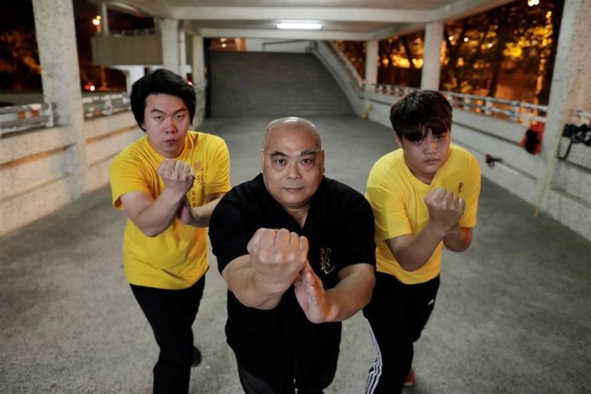 Wong You Kau and students in Hong Kong. Source: Reuters. 